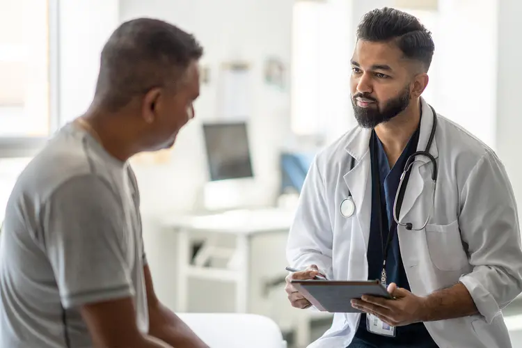 Doctor using Reach AI telemedicine platform